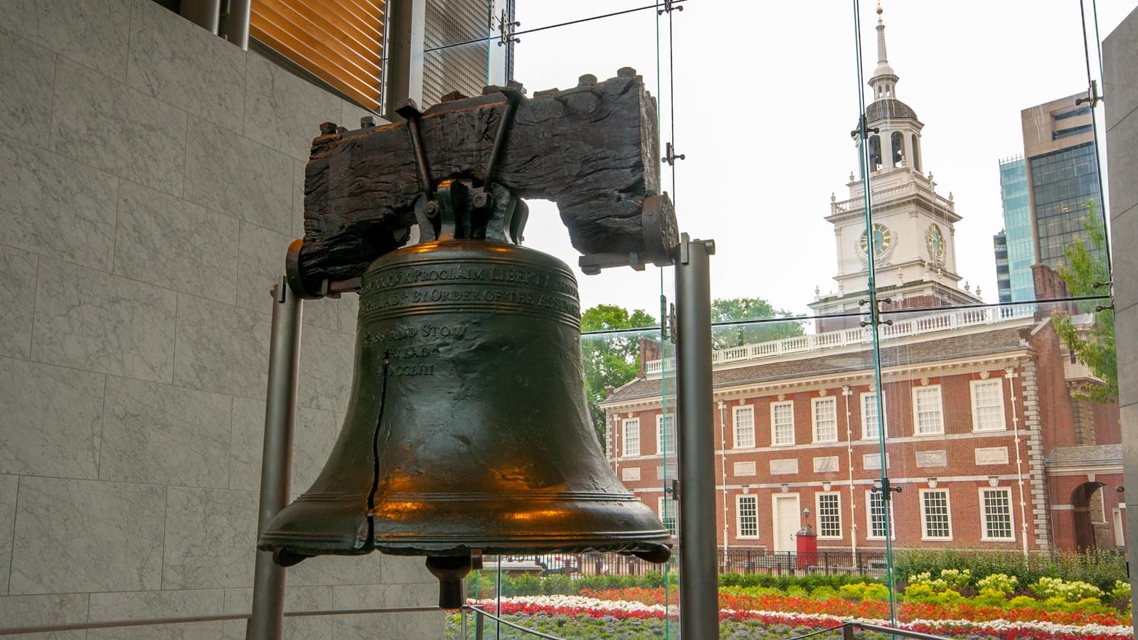 Liberty Bell with Independence Hall background.