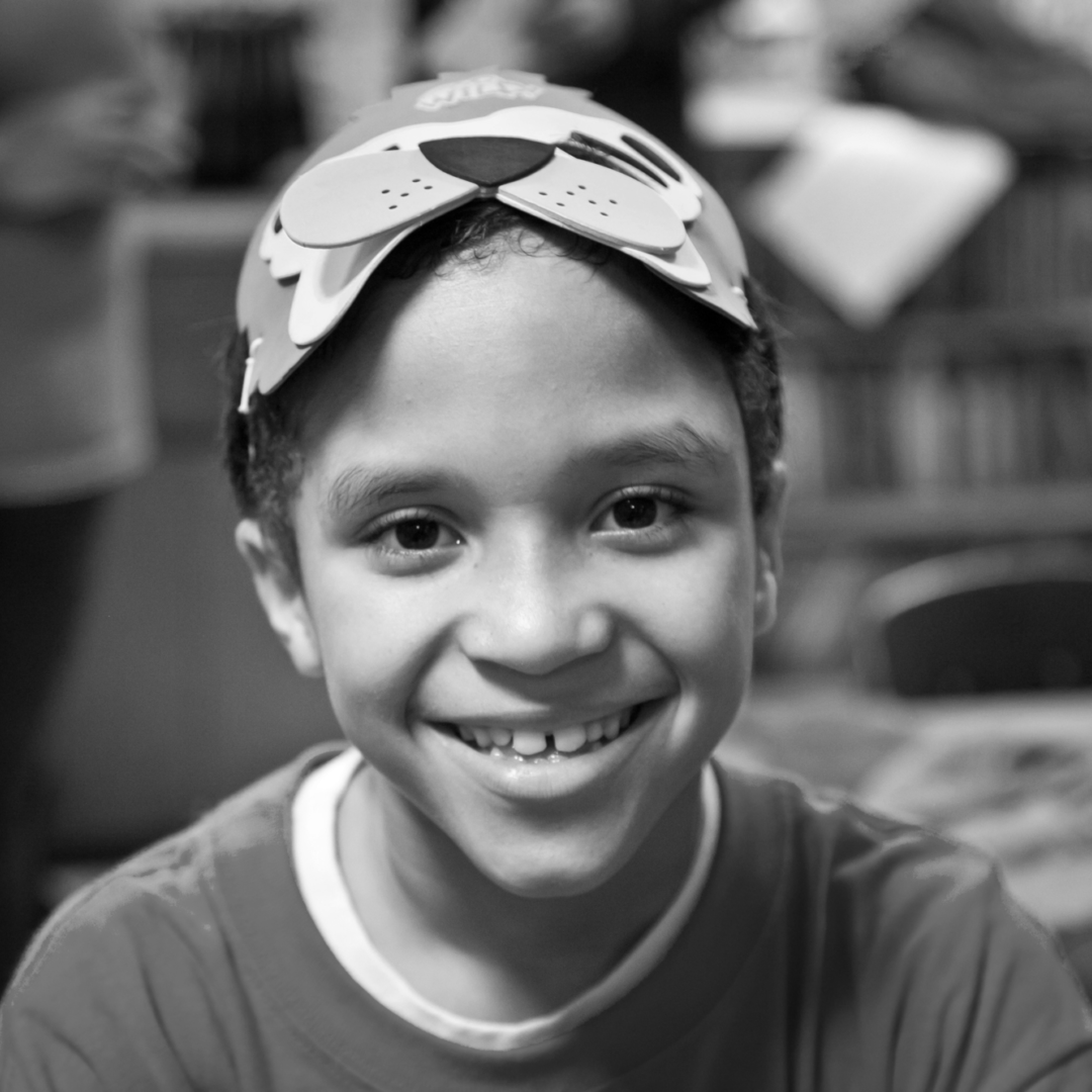 A grayscale image of a child